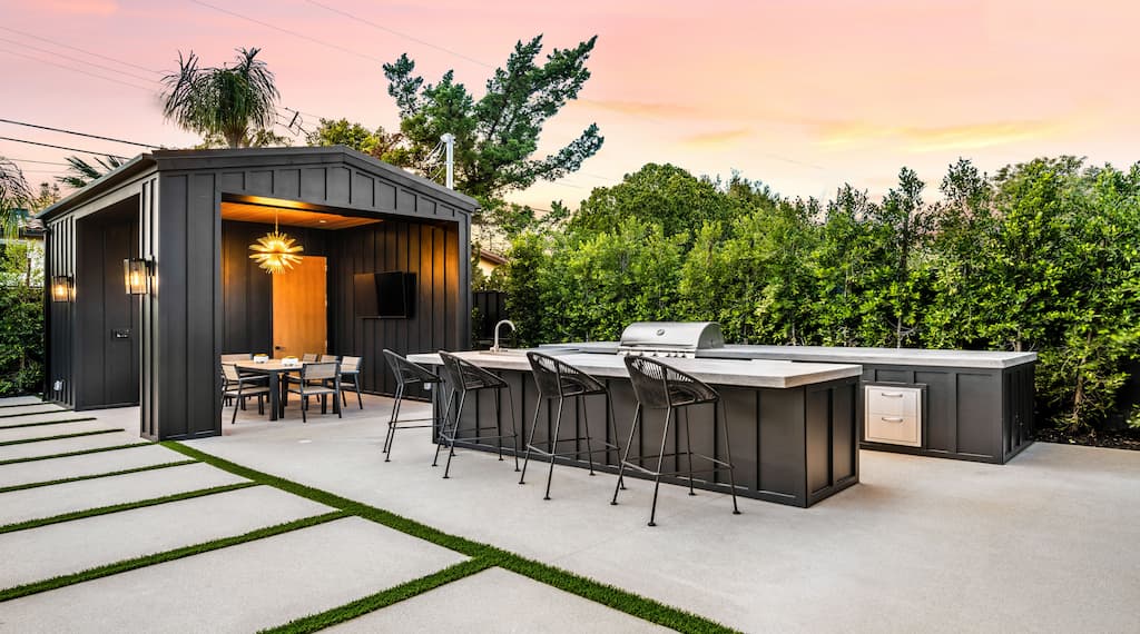 Modern Dining Area With Outdoor Kitchen Cabinets